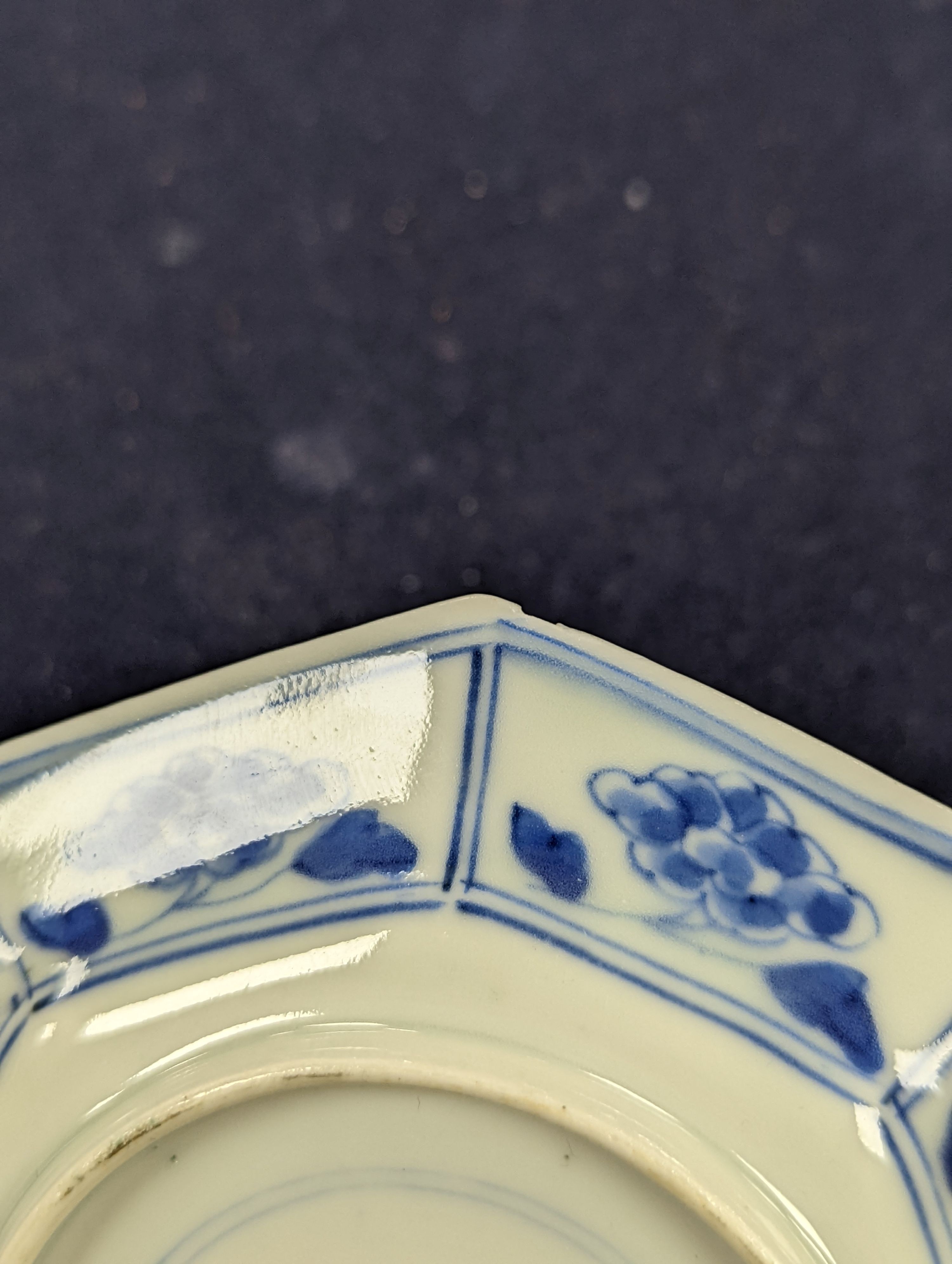 A Japanese blue and white vase, two similar dishes and a tea bowl and saucer